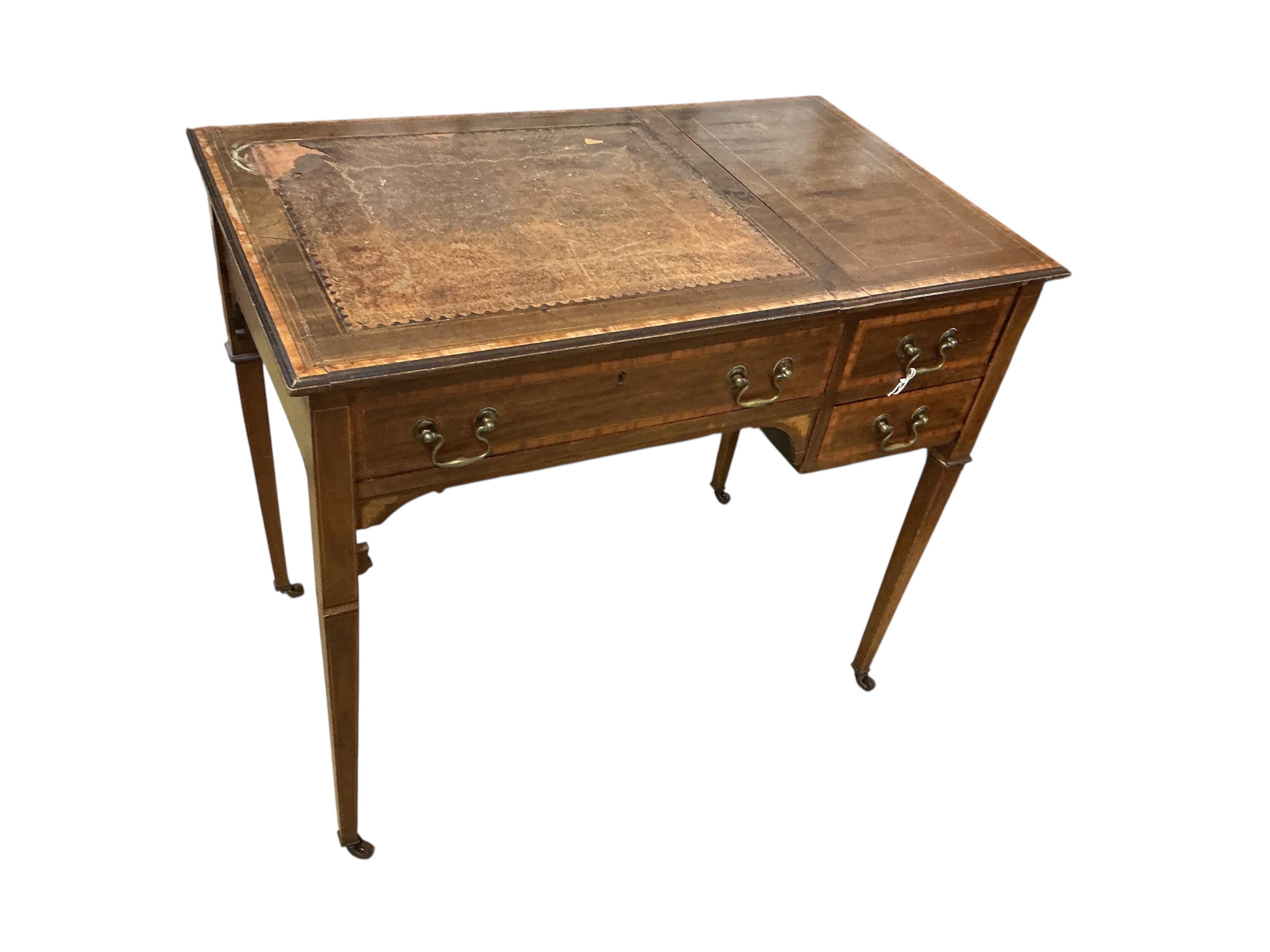 An Edwardian satinwood banded mahogany kneehole writing table, width 85cm, depth 50cm, height 74cm